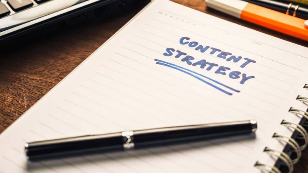 Content planning and strategy notes in a notebook on a desk